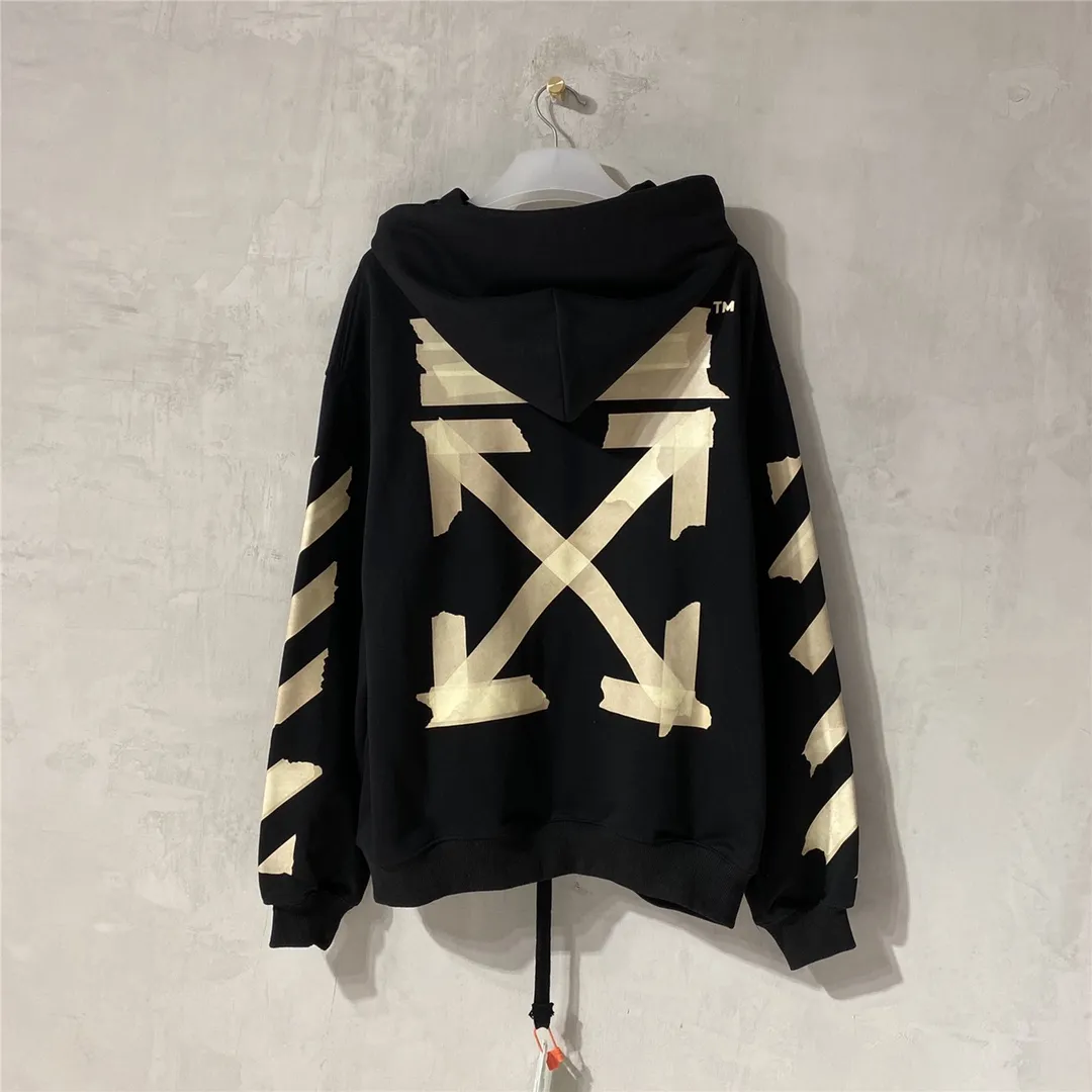 Spring and autumn top tested version OFF WHITE OW hot stamping strip printing male and female couples pure cotton loose same style pullover hooded sweatshirt The printing is done on a Japanese-owned Mimaki printing machine, with no edges or burrs. Inkjet heat transfer is hot-pressed and cold-teared, and the high temperature is 180 degrees. The front piece needs to be pressed twice (the second time requires 180kg of air pressure). The transparent fabric is anti-scratch and ironing, and the printing is fog-free. The semi-transparent tape in the front circle can reveal the part of the printing underneath. The golden printing color of the tape is not The flat color and tape printing overlap have different color depths. The wash label is also customized according to the original font. The accessories still use the full line of correct accessories. The rectangular woven collar label design is cancelled. The previous three-dimensional silicone feel font is changed to a fully woven collar label. Fluorescent fonts can be seen on the collar label. The five-link silicone hangtag, three-link washable label and zebra crossing packaging line are still the same. 480g pure cotton terry fabric, a major launch with full drape. A full set of customized accessories, one-to-one mold opening, professional ow. Size: XS-L Size chart